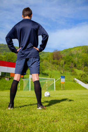soccer player shooting at goalの写真素材
