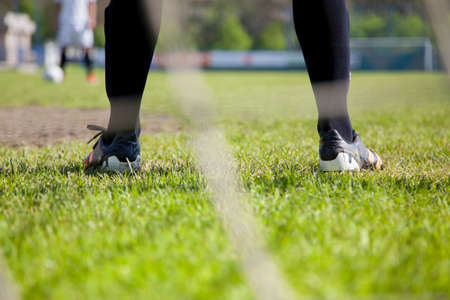 Shoot of football player and goalkeeperの写真素材