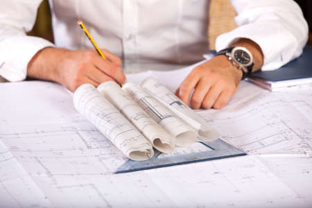 Architect designing house for client
