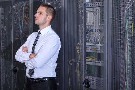 business man engeneer in modern datacenter server room