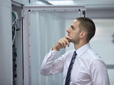 business man engeneer in modern datacenter server room