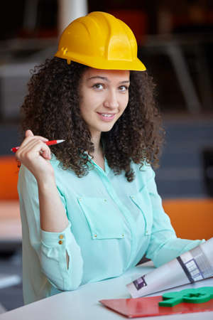 Young female architect in officeの写真素材