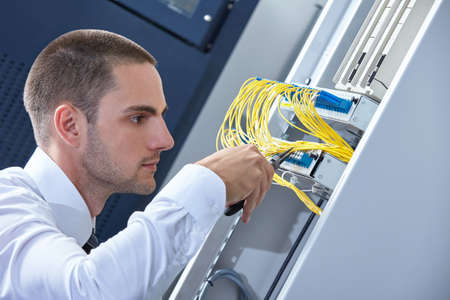 business man engeneer in modern datacenter server room