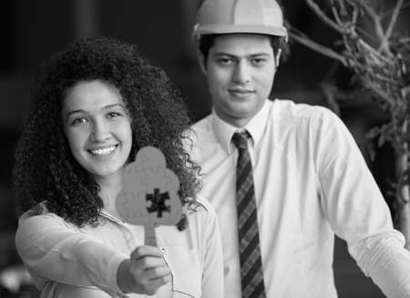 Young Architects in office looking at construction projectの写真素材