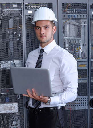 business man engeneer in modern datacenter server room