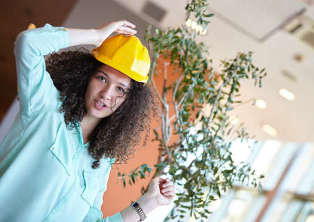 Young female architect in office
