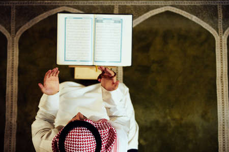 Religious muslim man praying inside the mosqueの素材 [FY31092247095]