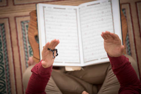 Religious muslim man praying inside the mosqueの写真素材