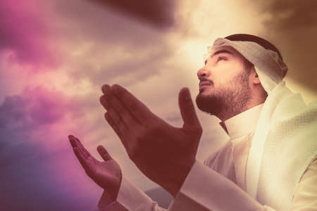 The iIslamic man praying   on the mountain.