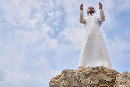 The Muslim man praying on the mountain.の写真素材