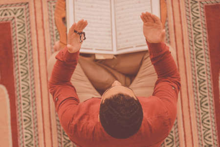 Religious muslim man praying inside the mosqueの写真素材
