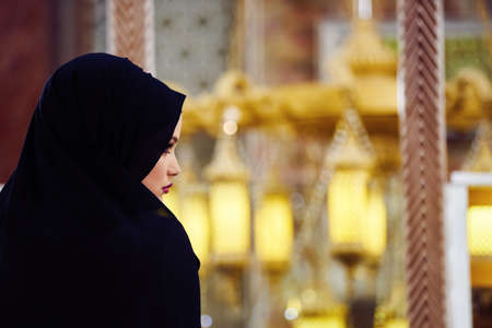 Young muslim woman praying in mosqueの写真素材