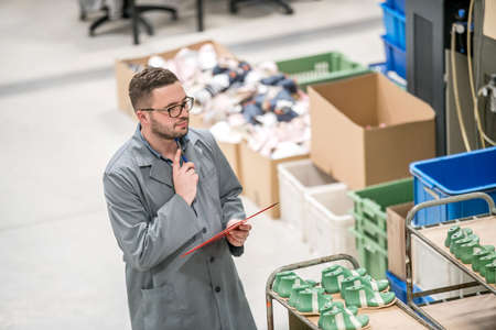 manager at a leather shoe manufacturing factory. inventoryの写真素材