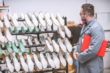 manager at a leather shoe manufacturing factory. inventory