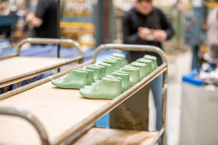 Various moulds used in shoe production line. shoe factoryの写真素材