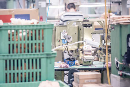 machinery and conveyor belts used in shoe manufacturing. factoy