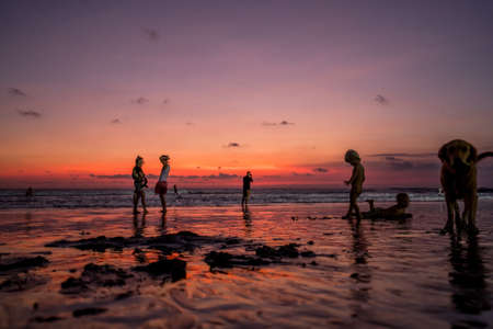 People walking at the beach, summerの写真素材