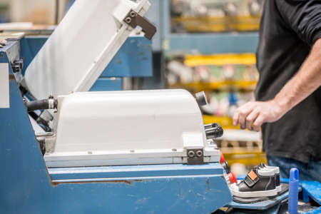 machinery and conveyor belts used in shoe manufacturing. factoyの写真素材
