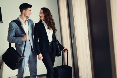 Couple at a hotel lobby hall, hotelの写真素材