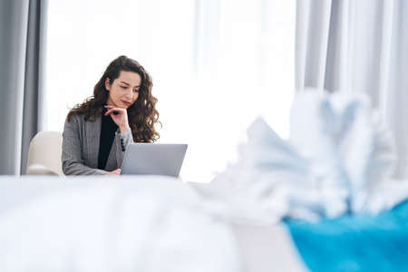 Working from a hotel roomの写真素材