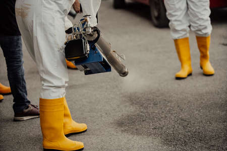 Coronavirus Quarantine. Disinfection and decontamination on a public place and factory as a prevention against Coronavirus disease 2019, COVID-19. State of emergency over pandemia with coronavirus.の写真素材