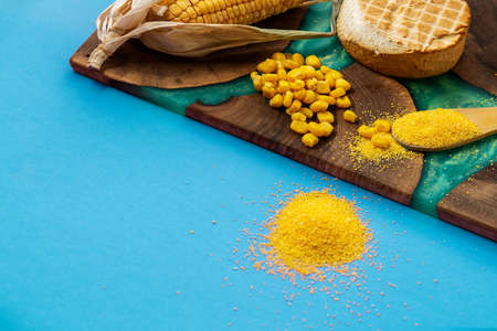 Polenta or cornmeal on luxury nut tree epoxy plank with  green resinの写真素材