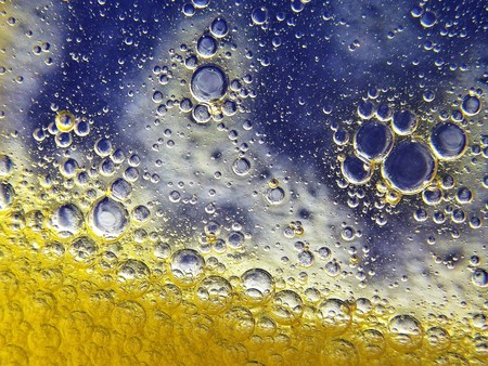 Bubbles of body oil in a bathtub