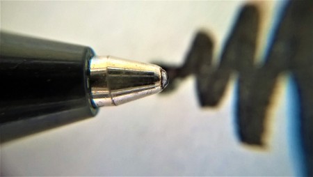 Detail of the tip of a black rollerballの写真素材
