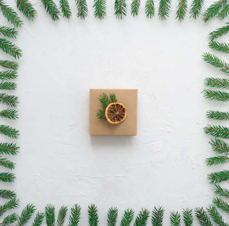 New Years gift on the background of green twigsの写真素材
