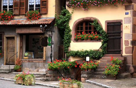Typical colored houses in Alsace. Route des vines – France. Half-timbered wall. Typical colored houses in Alsace. Route des vines – France. Half-timbered wall.