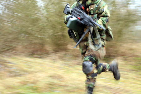 Soldiers game on military training ground ( batlle camp ). Actionの写真素材
