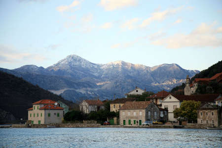 View on small town in Montenegro and Balkans Mountains range.の写真素材