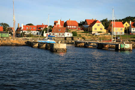 Gudhjem picturesque, small town by sunset on Bornholm Island, Denmark, Europe