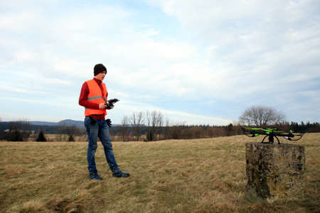 A young drone operator is testing new equipment.