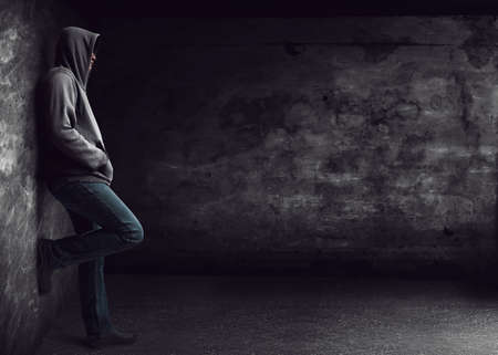 Man standing alone at nightの写真素材