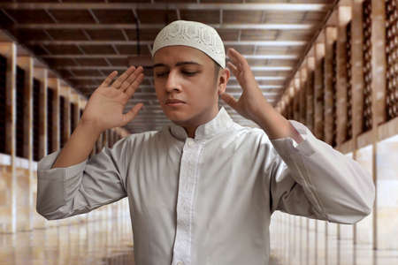 Muslim man praying in mosqueの写真素材
