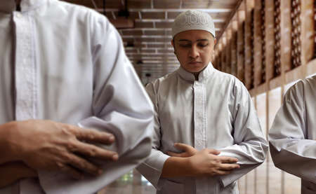 Muslim man praying in mosque