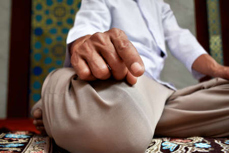 Muslim man praying in mosqueの写真素材