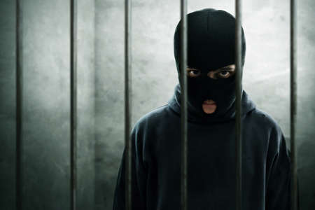 Masked thief in prison