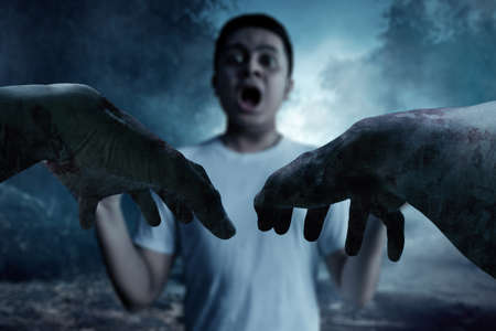 Scary zombie handsの写真素材