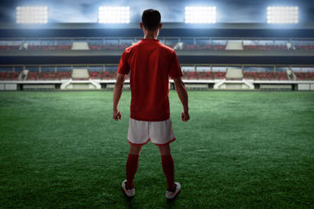 Soccer player standing on the fieldの写真素材