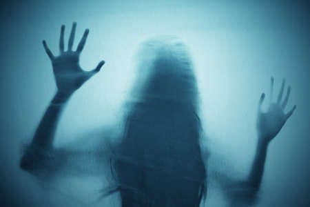 Shadow of scary ghost woman