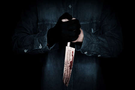 Killer with a bloody knife