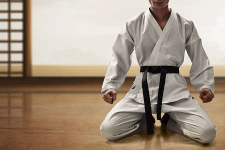 Karate martial arts fighter sittingの写真素材