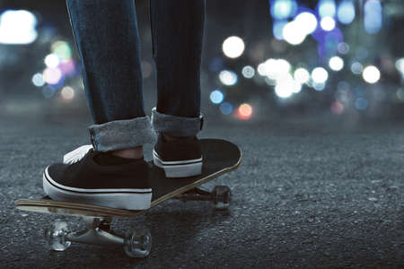 Skateboarder skateboarding on the streetの写真素材