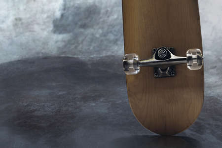 Close up of skateboard at skate park