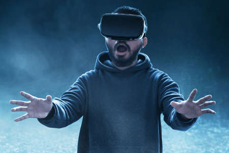 Man wearing virtual reality headsetの写真素材
