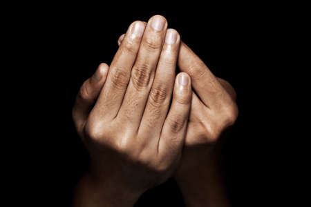Hands of muslim man praying