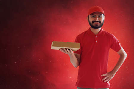 Delivery man on blue background