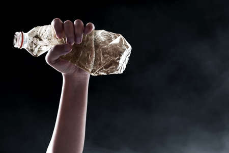 Plastic bottle in the oceanの写真素材